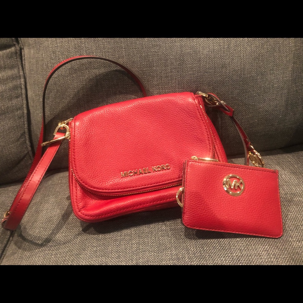 Red Michael Kors crossbody and wallet
